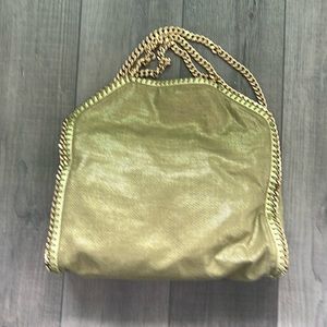 Stella McCartney Falabella bag in green and gold canvas.